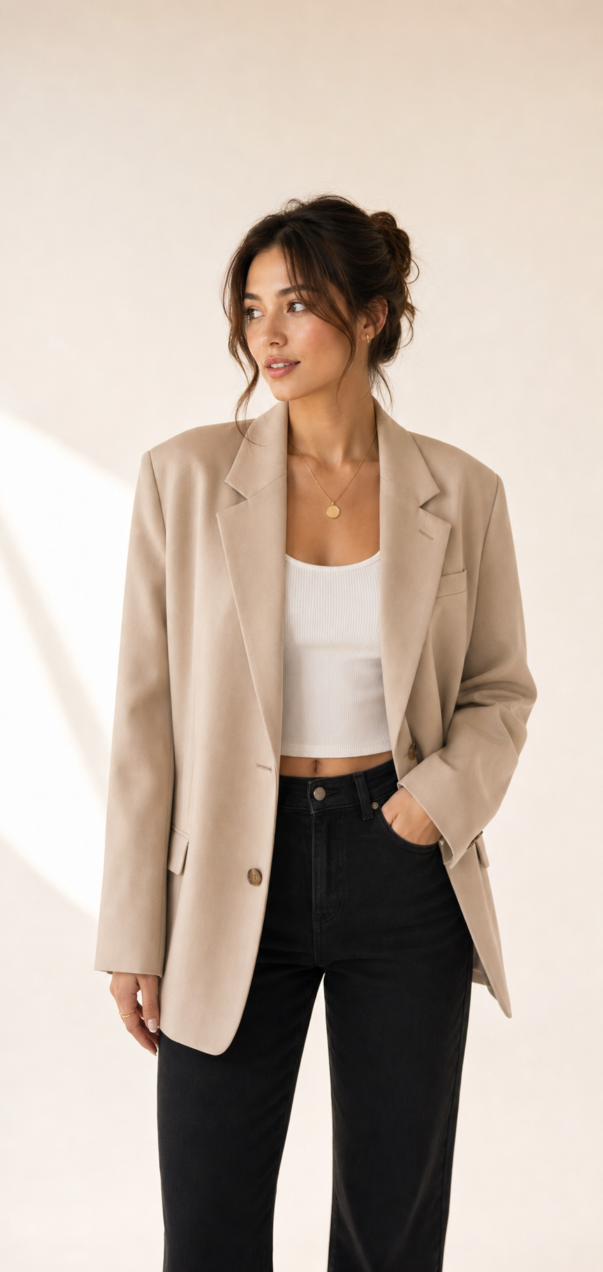 AI outfit demo wearing a beige blazer, white tank, black pants, and minimal accessories